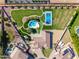 Aerial view showcasing a home, pool, and large backyard with sports amenities at 356 W Ivanhoe St, Gilbert, AZ 85233