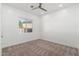 Light and airy bedroom with a window and ceiling fan at 356 W Ivanhoe St, Gilbert, AZ 85233