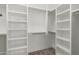 Bright walk-in closet with custom shelving at 356 W Ivanhoe St, Gilbert, AZ 85233