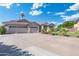 Single-story home with landscaped yard and two-car garage at 356 W Ivanhoe St, Gilbert, AZ 85233