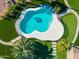 Aerial view of freeform swimming pool with surrounding patio at 356 W Ivanhoe St, Gilbert, AZ 85233