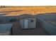 Private backyard with storage shed and open views at 35706 W Costa Blanca Dr, Maricopa, AZ 85138