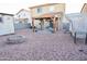 Backyard with covered patio, storage shed, and fire pit at 35706 W Costa Blanca Dr, Maricopa, AZ 85138