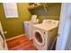 Convenient laundry room with washer and dryer included at 35706 W Costa Blanca Dr, Maricopa, AZ 85138