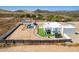 Aerial view of a house with a pool, trampoline and large backyard at 36627 N 18Th Dr, Phoenix, AZ 85086