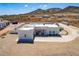 Aerial view of a single-story house with a gravel driveway at 36627 N 18Th Dr, Phoenix, AZ 85086