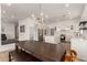 Modern kitchen with island, stainless steel appliances, and white cabinetry at 36627 N 18Th Dr, Phoenix, AZ 85086