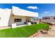 Covered patio with artificial turf and mountain views at 36627 N 18Th Dr, Phoenix, AZ 85086