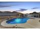 Inviting kidney-shaped pool with a relaxing patio area at 36627 N 18Th Dr, Phoenix, AZ 85086