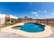 Stunning kidney shaped pool with a rock waterfall feature at 36627 N 18Th Dr, Phoenix, AZ 85086