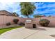 Enjoy this backyard with a built-in BBQ and concrete area, perfect for entertaining at 3711 E Sandy Way, Gilbert, AZ 85297