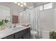 Bathroom with a modern vanity, a large mirror, and a shower-tub combo at 3711 E Sandy Way, Gilbert, AZ 85297