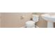 Clean bathroom with toilet, sink, and tile floor at 41705 N Globe Ct, Phoenix, AZ 85086