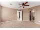 Bright bedroom with ceiling fan and carpet at 41705 N Globe Ct, Phoenix, AZ 85086