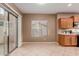 Bright dining area with tile floors and a view of the backyard at 41705 N Globe Ct, Phoenix, AZ 85086