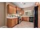 Modern kitchen with wood cabinets, stainless steel appliances at 41705 N Globe Ct, Phoenix, AZ 85086