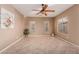 Bright living room with tile floors and large windows at 41705 N Globe Ct, Phoenix, AZ 85086