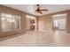 Spacious living room with tile floors and a view of the kitchen at 41705 N Globe Ct, Phoenix, AZ 85086