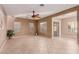 Living room with tile floors and access to a patio at 41705 N Globe Ct, Phoenix, AZ 85086