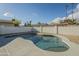 Relaxing kidney-shaped pool surrounded by a large patio at 4910 W Townley Ave # 4910, Glendale, AZ 85302