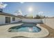 Inviting kidney-shaped pool with ample patio space at 4910 W Townley Ave # 4910, Glendale, AZ 85302