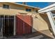 Backyard with wooden fence and security camera at 5005 S Mill Ave, Tempe, AZ 85282