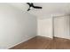 Spacious bedroom featuring wood floors and ample closet space at 5005 S Mill Ave, Tempe, AZ 85282