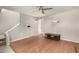 Bright living room with hardwood floors and ceiling fan at 5005 S Mill Ave, Tempe, AZ 85282