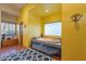 Bathroom with large soaking tub and yellow walls at 5113 W Arrowhead Lakes Dr, Glendale, AZ 85308