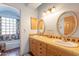 Bathroom with double vanity and colorful tile at 5113 W Arrowhead Lakes Dr, Glendale, AZ 85308