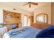 Bedroom with built-in shelves and private access at 5113 W Arrowhead Lakes Dr, Glendale, AZ 85308