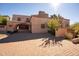 Spanish style home with gated entrance and brick driveway at 5113 W Arrowhead Lakes Dr, Glendale, AZ 85308