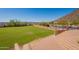 Expansive grassy lawn with mountain views and a brick staircase at 5113 W Arrowhead Lakes Dr, Glendale, AZ 85308