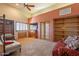 Main bedroom with sitting area and ample closet space at 5113 W Arrowhead Lakes Dr, Glendale, AZ 85308