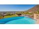 Infinity pool with tennis court and city views at 5113 W Arrowhead Lakes Dr, Glendale, AZ 85308