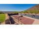 Private lighted tennis and basketball court with mountain views at 5113 W Arrowhead Lakes Dr, Glendale, AZ 85308