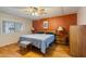 Spacious bedroom with ceiling fan and large window for natural light at 5402 E Mckellips Rd # 276, Mesa, AZ 85215