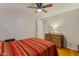 Bedroom with dresser, ceiling fan, and wood floors at 5402 E Mckellips Rd # 276, Mesa, AZ 85215