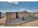 Home exterior with side yard and AC unit at 5402 E Mckellips Rd # 276, Mesa, AZ 85215