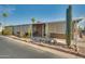 Front view of the house showcasing a covered patio and desert landscaping at 5402 E Mckellips Rd # 276, Mesa, AZ 85215