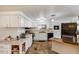 Well-equipped kitchen with granite countertops and white cabinets at 5402 E Mckellips Rd # 276, Mesa, AZ 85215