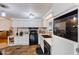 Modern kitchen with black appliances and a granite countertop at 5402 E Mckellips Rd # 276, Mesa, AZ 85215