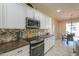 Well-equipped kitchen with stainless steel appliances and backsplash at 5845 N Turquoise Ln, Eloy, AZ 85131