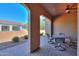 Covered patio with seating area and view of backyard at 5845 N Turquoise Ln, Eloy, AZ 85131