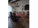 Dining room with a large table, ornate chairs, chandelier, and decorative wall art at 6124 N 130Th Ave, Litchfield Park, AZ 85340