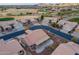 Aerial view of a house and surrounding neighborhood, showcasing the property's location and landscape at 6403 S Fairway Dr, Gold Canyon, AZ 85118