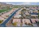 Aerial view of a residential neighborhood with golf course and mountain views at 6403 S Fairway Dr, Gold Canyon, AZ 85118