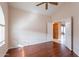 Bedroom with wood floors, ceiling fan and window coverings at 6403 S Fairway Dr, Gold Canyon, AZ 85118