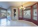 Bright dining area with tiled floors and large windows at 6403 S Fairway Dr, Gold Canyon, AZ 85118