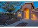 Front entryway with an arched entry and security door at 6403 S Fairway Dr, Gold Canyon, AZ 85118